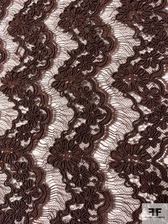 brown lace fabric with flowers on it