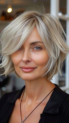 22 Hairstyles Enhancing Round-Faced Older Women's Beauty Wispy Chin Length Hair, Hair Up Bob Length, Short Choppy Blonde Bob, Chin Length Hair With Side Bangs, Messy Bob For Fine Hair, Hair Thinning Techniques For Thick Hair, Chic Chin Length Hair, Choppy Bob With Side Swept Bangs, Cute Short Cuts For Women