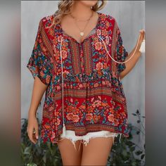 New In Original Packaging Women's Red Floral Bohemian Short Sleeve Babydoll Tunic Blouse. Plus Size 3x Rayon. Red Summer Tunic Top, Casual Red V-neck Peasant Top, Red Relaxed Fit Beach Blouse, Red Bohemian Tunic Top, Red Relaxed Fit Blouse For Beach, Red Boho Print Tops For Vacation, Red Boho Print V-neck Top, Red Bohemian Short Sleeve Tops, Red Bohemian Top With Floral Print