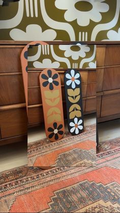 three decorative items sitting on top of a rug