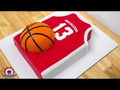 a birthday cake with a basketball on top