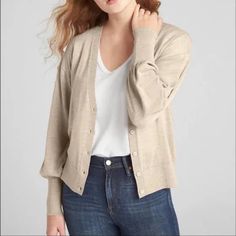 This Classic Yet Fashionable Button Down Cardigan Is Perfect For Cool Summer Night Or Fall. It Features V-Neck With Long Balloon Sleeves With Rib-Knit Cuffs, Rib-Knit Hem And Button-Front (Button Color Same As Material).Straight Silhouette With An Easy Fit That Hits At The Hip. 100% Merino Wool Color: Oatmeal Heather (Similar To Tan). Classic Gap Tops For Fall, Classic Everyday Outerwear By Gap, Classic Winter Tops From Gap, Everyday Fall Outerwear By Gap, Classic Everyday Gap Outerwear, Gap Fall Outerwear For Everyday, Gap Cardigan With Button Closure For Fall, Classic Gap Tops For Winter, Gap Long Sleeve Cardigan For Spring