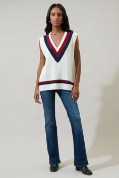 Create a look with the Luxora Color Block Oversized Vest Top. A sleeveless look takes on a deep v-neckline, with an oversized fit on this vest. The color block design has stripes outlined. Pair it with skinny jeans to match. - Deep v-neck- Sweater- Color block- Oversized fit- Color: White MultiSize + Fit - Model is 5'10" and wearing size XS- Measurements taken from size S - Chest: 21 1/2"- Length: 24 1/4" Fabric Self: 100% Acrylic Style Number STT17478 Chic Striped V-neck Vest, Casual Striped V-neck Sweater Vest, Striped V-neck Tank Top, White V-neck Top With Contrast Stripes, White V-neck Tops With Contrast Stripes, Striped V-neck Vest Top, White Sleeveless Tank Top With Contrast Stripes, White V-neck Vest For Fall, Oversized Vest