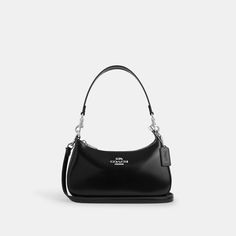 Find COACH OUTLET Teri Shoulder Bag on Editorialist. Spazzolato leather Inside multifunction pocket Zip-top closure fabric lining Detachable handle with 8 1/2 drop Detachable strap with 22 3/4 drop for shoulder or crossbody wear 9 1/2 (L) x 6 (H) x 3 (W) Style No. CV938 Coach Outlet Teri Shoulder Bag - Brown Black Coach Shoulder Bag, Coach Black Shoulder Bag, Coach Black Bag, Cute Coach Bags, Coach Teri Shoulder Bag, Black Coach Bag, Coach Bags Outlet, Black Coach Purse, Coach Outlet