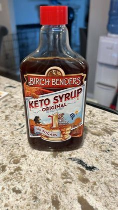 a bottle of keto syrup sitting on top of a counter