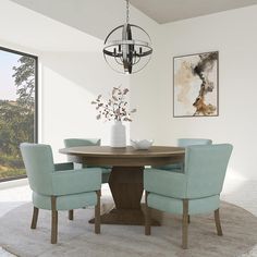 a dining room table with blue chairs around it