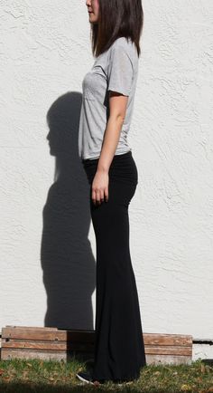 "Comfy and easy black wide leg pants you can wear more than lounging and exercise Fold over waist with side draw strings Fitted over knees and flares beautifully at the bottom Wear it around town for easy walk or shopping at farmers market -Fits like glove -Wide bottom -Double layered waist panel goes under the chest. It can be worn as a maternity pants in this way. -Draw Strings attached on both waist sides to create shirring when they are pulled -Waist sits below naval when the double layered Black Wide-leg Yoga Bottoms, Black Wide-leg Pants For Yoga, Black Wide-leg Yoga Pants, Black Full-length Bohemian Harem Pants, Black Full Length Bohemian Harem Pants, Stretch Black Bottoms For Maternity Wear, Black Stretch Maternity Bottoms, Stretch Black Maternity Pants, Black Stretch Maternity Pants