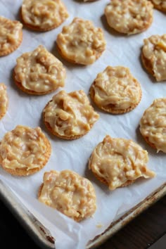 there are many small cookies on the baking sheet ready to be baked in the oven