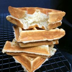 a stack of waffles sitting on top of a cooling rack