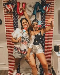 two women in patriotic outfits posing for the camera