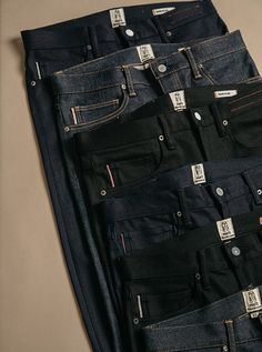 Slim Tapered Fit (Skinny fit and Slim fit are also available) Indigo Black, Raw 10.5 oz What is denim weights? 96% COTTON/4% POLYURETHANE 4-Way stretch selvedge denim Black Warp/Blue Weft Made in USA Model is 6'2" and wearing a size 32. Our premium denim is inspired by the classic vintage blue jean. Our Premium Japanese 4-Way Stretch Selvedge denim story starts in Japan where our fabric is developed at one of the oldest denim mills. We blend a unique 4 way stretch material with selvedge denim to Cotton Citizen, Retro Brand, Selvedge Denim, Denim Branding, Tapered Jeans, Good Looking Men, Premium Denim, Blue Jean, Classic Vintage