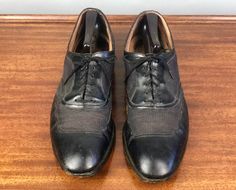 "These ventilated black oxfords will comfortably complete your vintage outfit! These 1940s apron toe shoes by \"Knapp\" have a purple/gray colored nylon mesh along the top and sides, six eyelets, and leather interiors. These shoes are a black leather and come with the original flat cotton laces. These shoes are in great vintage condition with some very light scuff marks consistent with age. Marked a size 13.5, please see the measurements for accuracy: Insole Length: 11.75\" Outsole Length: 13.25 1980s Glass Bottoms Men Dress Shoe, 1940s Apron, Black Apron, Black Oxfords, Vintage Outfit, Shoes Vintage, Vintage 40s, Purple Gray, Mens Oxfords