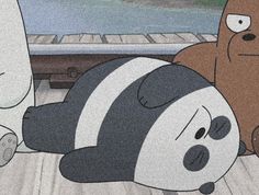 an animated panda bear laying on the floor next to another animal