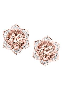 METAL SPECIFICATIONS Metal Name: Rose Gold 14K STONE SPECIFICATIONS Stone Name: MORGANITE/DIAMOND Stone Cut : Round cut Stone Specifications: There are two morganites approx. 5.25 carats each (Approx. Dia. 11.3 mm) & approx. 0.35 carats round smaller diamonds on the side in each earring. Natural earth-mined stones. Total Stone Weight : approx. 11.20 carats Color : Peach/F Clarity : AAA/VVS1 APPRAISAL Appraised Value : $9000.00 Comes with a FREE APPRAISAL Gold Feather Earrings, Stud Earrings Diamond, Morganite Earrings, Yellow Gold Diamond Earrings, Rose Gold Earrings Studs, Studs Gold, Morganite Diamond, Flower Earring, Rose Gold Studs