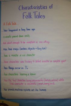 the characteristics of folk tales written on a white board with blue border and writing underneath