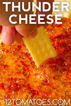 a hand holding a piece of cheese over a pizza crust with the words, how to make homemade thunder cheese