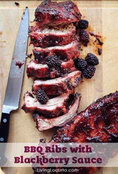 bbq ribs with blackberry sauce on a cutting board