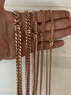 "Amazing quality men's or women's miami cuban link chains or bracelets SOLID 925 sterling silver with 14k rose gold finish Very secure Box lock clasp These are great for pendants or for wearing alone! This will become your favorite chain instantly 4mm-10.5mm Here are the weights for 24\" chains (if you chain is shorter or longer, the weight will vary) 4mm- 25.5g 5mm- 43.82g 6mm- 60.24g 8mm- 111.2g 10.5mm- 167g 7\" - 9.5\" bracelets 18\" - 30\" chains Lays Flat! Very shiny and nicely made! Handma Rose Gold Link Jewelry With Curb Chain, Rose Gold Cuban Link Necklace With Curb Chain, Miami Cuban Link Chain, Miami Cuban Link, Cuban Link Chain Necklaces, Star Chain, Mens Chain Necklace, Miami Cuban, Necklace Box