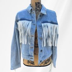 Nwt Vigoss Denim Faux Leather Fringe Jacket Size Small Could Fit A Medium Msrp $169 Nwt 100% Cotton Oversized Festival Boho Western Jean Denim Trending Add Some Bohemian Flair To Your Wardrobe With This Denim Jacket. This Mid-Length Jacket Features Long Sleeves, A Button Closure And A Relaxed Fit. The Fringe Accents Give A Retro Cowgirl Vibe. Spring Rodeo Outerwear With Fringe, Medium Wash Outerwear For Rodeo In Fall, Fall Denim Outerwear With Fringe, Fitted Winter Outerwear With Frayed Hem, Casual Medium Wash Outerwear With Fringe, Spring Rodeo Outerwear With Pockets, Casual Denim Outerwear With Fringe, Trendy Denim Outerwear With Fringe, Casual Spring Outerwear For Rodeo