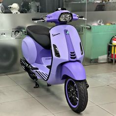 a purple scooter parked in front of a counter