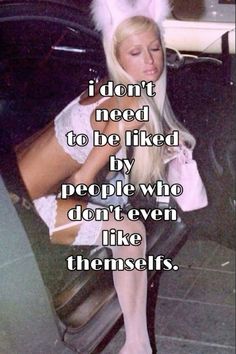 a woman sitting on top of a chair with her legs crossed and the caption i don't need to be fired by people who doesn't even like themselves