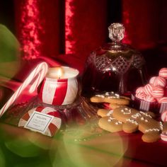 a table topped with lots of candy and cookies