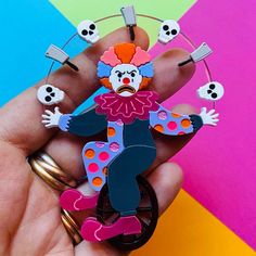 Product Details Handmade item Length: 9.5 Centimeters; Width: 6.5 Centimeters Materials: Plastic Made to Order Do you remember our cute acrobat clown with his colored balls? We decided to refresh his style and colors .. and now he is ready to celebrate Halloween! Our super creepy clown is made from three acrylic sheets and painted with fluo acrylic paint.Maintenance:Acrylic is a fairly delicate material and can scratch easily. Please, use only a microfiber cloth to clean it (like the one used fo Acrobat Clown, Clown Stuff, Circus Aesthetic, Acrylic Brooch, Cute Clown, Clowning Around, Creepy Clown, Halloween 2022, Sketch Inspiration