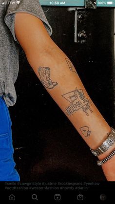 a person with a tattoo on their arm