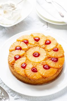 a pineapple upside down cake on a white plate