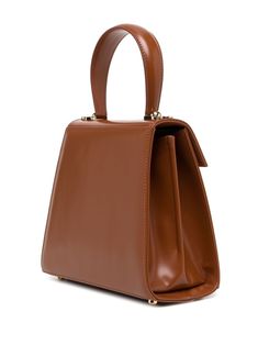 This Ferragamo tote bag is crafted from brown calf leather and features a gold-tone Gancini buckle, a single rounded top handle, and a foldover top. It can be hand carried or worn on the shoulder. Ferragamo Bag, Salvatore Ferragamo, Top Handle, Calf Leather, Messenger Bag, Satchel, Buckle, Tote Bag, Leather