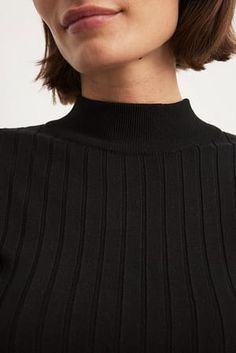 Long Sleeve Wide Ribbed Knitted Top Black Black High Neck Top With Ribbed Neckline, Black Turtleneck Top With Ribbed Neckline, Ribbed Turtleneck Knit Top For Work, Black Ribbed Turtleneck For Workwear, Black Fine Knit High Neck Top, Knitted Top, Soft Knits, Stretchy Material, Long Sleeves