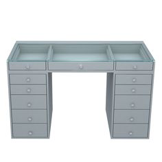 a gray desk with drawers and glass top