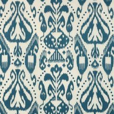 a blue and white pattern on fabric