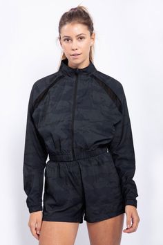 This active jacket cuts a cropped silhouette with a mock neck and features a mesh detail where the raglan seaming is. It has an elasticized waistband and cuffs, zips all the way up, and has zipper side pockets, 100% recycled polyester. Sporty Track Jacket With Elastic Cuffs, Sporty Long Sleeve Track Jacket With Elastic Cuffs, Spring Athleisure Activewear With Zipper Closure, Fall Techwear Activewear For Sports, Spring Athleisure Half-zip Track Jacket, Fall Workout Track Jacket With Zipper Closure, Functional Track Jacket With Zipper For Workout, Nylon Stretch Track Jacket For Fall, Functional Track Jacket With Zipper Closure For Workout