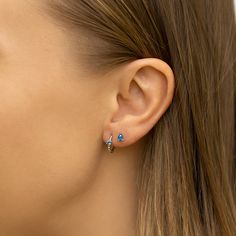 Minimal Silver Vermeil Huggie earrings with sparkly Blue Zircon gemstone details. Perfect to wear alone or paired with other dainty earrings.| Lead and Nickel free.Sold as a PAIR .925 Sterling Silver Blue Zircon Cubic Zirconia Gemstone Gemstone Size 3mm(0.12in) Inside Diameter 8.5mm(0.3in), Width 1.5mm(0.06in) Hinge closure #E552-SBL 3 Ear Piercings, Second Ear Piercing, Gold Huggie Earrings, Double Piercing, Minimal Gold, Zircon Gemstone, Earrings Aesthetic, Korean Earrings, Huggie Earrings