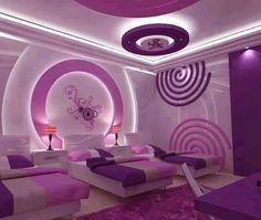 a purple and white bedroom with circular lights