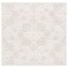 a white rug with an intricate design on the front and back side, in neutral tones