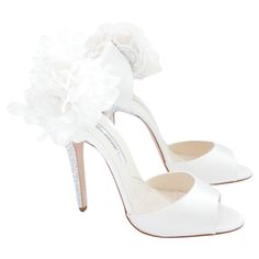 Absolutely exquisite wedding from Brian Atwood’s limited edition bridal collection. bought for £1200 and are unworn with box and spare heel tips (Box has a few marks). Superbly crafted from thick cream silk satin, they have stunning faux pearl trimmed floral corsages on the side. These have been supplied by the Atelier Lemarie which is the legendary workshop that makes Chanel’s camellias. They have crystal embellished sturdy high heels and leather thong straps to ankles - can be worn with or wit Crystal Heels, Color Crema, Wedding Shoes Heels, Brian Atwood, Miuccia Prada, Cream Silk, Bridal Shoes, Bridal Collection, Giuseppe Zanotti