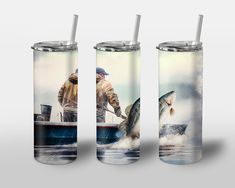 three insulated tumblers with two men fishing on the same boat and one holding a fish