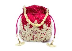 multi color pearl beaded embellish woman handbag drawstring potli purse | fuchsia pink fabric hand made bag for woman | indian pouch handbagDesigned with the heart, this beautiful Potli or batawa bag are eye catchy and made of premium material.Key Features:Embroidery art workThis potli is good match with both Indian and western outfits and are superb for wedding and festive partiesThis would be best complement to your designer saree, lenhga or any other kind of dressThis is the combination of tr Beaded Potli Bag For Festivals Gift, Festival Beaded Potli Bag As A Gift, Beaded Potli Bag For Festivals And Gifts, Beaded Potli Bag For Festivals, Beaded Potli Bag For Festive Occasions, Festive Beaded Potli Bag For Festivals, Traditional Pink Beaded Bags, Festival Beaded Pouch Potli Bag, Beaded Festival Potli Pouch Bag