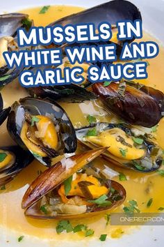 mussels in white wine and garlic sauce on a plate with text overlay