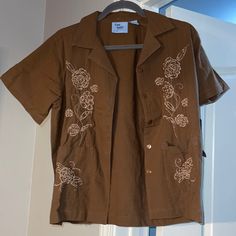 Nwt Vintage Petite Brown Top With Button Down, Short Sleeves, Pockets At Hip Level, Slits On The Side And Beaded Floral Details. Excellent Condition From A Smoke Free Dog Friendly Home. Brown Tops With Snap Buttons For Spring, Spring Brown Tops With Snap Buttons, Ashley Brown, Free Dogs, Brown Top, Dog Friendly, Button Downs, Button Down Shirt, Short Sleeves