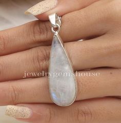 Rainbow Moonstone Pendant, 925 Sterling Silver Pendant, June Birthstone Pendant, Gemstone Necklace, Handmade Jewellery, Pear Shaped Pendant. Gemstone Name- Rainbow Moonstone Stone quality - AAA Pendant size - Height - 5 cm, Width - 1.5 cm  Pendant weight - 8.38 grams Stone Shape - As shown in the picture The Height of the pendant including the loop is 5 cm  18 inch Chain - The total length of the chain is 18 inch including a 2-inch adjustable chain. So you can adjust the chain from 16 inches to 18 inches. You adjust the chain by placing the lock on the adjustable chain as per your requirement. The motive of adding a 2 inch adjustable is to give our buyers an option to flaunt with different pendants in different ways. Chain Weight - 3 grams  The Pendant and the chain are stamped 925 which s Pear Shaped Pendant, Rainbow Moonstone Pendant, Moonstone Stone, Birthstone Pendant, June Birthstone, Moonstone Pendant, June Birth Stone, Handmade Jewellery, Necklace Handmade