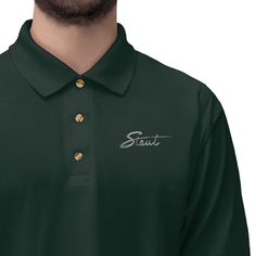 a man wearing a green polo shirt with the word scott on it's chest