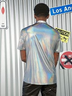 Achieve a unique look with this Men's Holographic Short Sleeve Shirt. It offers a cool design and is crafted from a lightweight fabric that is soft and comfortable. Featuring short sleeves, this shirt is eye-catching and designed to be a conversation starter. 95%Viscose, 5%PolyamideImportedButton closureHand Wash or Machine Wash Men's Size Chart Small Medium Large XL XXL Chest 21 22 23 24 25 Bottom Opening 18 1/2 19 1/2 20 1/2 21 1/2 22 1/2 Back Length 26 1/2 27 1/2 28 1/2 29 1/2 30 1/2 Shoulder 18 1/2 19 1/2 20 1/2 21 1/2 22 1/2 Sleeve Length 35 36 37 38 39 Modern Short Sleeve Shirt With Graphic Print, Modern Short Sleeve Graphic Print Shirt, Modern Short Sleeve Graphic Shirt, Modern Collared T-shirt For Summer, Cool Short Sleeve Tops With Relaxed Fit, Cool Relaxed Fit Short Sleeve Tops, Men’s Raves Outfit, Holographic Top, Blue Short Sleeve Shirt