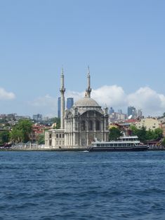 It looked like it was sitting on top of water. Beautiful architecture! That is Istanbul city in background. #istanbulmosques #BosphorusStrait #Istanbul #minarets Bosphorus Strait, Buses And Trains, Douro Valley, Boat Ride, River Boat, Beautiful Sights, Wine Tour, Beautiful City, Train Travel