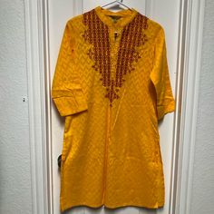 Indian Global Desi Mustard Cotton Kurti / Tunic With Embroidery Size: M Pit To Pit: 20” Shirt Length: 37” Brand New With Tag #Indian #Pakistani #Kurti #Tunic Casual Festive Kurta With Intricate Embroidery, Traditional Yellow Tunic For Festive Occasions, Traditional Short Sleeve Kurta For Spring, Traditional Short Sleeve Spring Kurta, Embroidered Casual Kurta For Festive Occasions, Casual Embroidered Kurta For Festive Season, Casual Embroidered Festive Kurta, Casual Embroidered Traditional Wear For Festive Season, Casual Embroidered Festive Traditional Wear