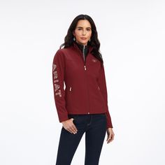 Embroidered in a design inspired by the western art of saddle tooling, the Aparajo is a classic softshell jacket purposefully crafted to keep you comfortable and dry on breezy, wet days at the barn or in the arena.\n\t\tAparejo Team Softshell Jacket | Women's Aparejo Team Softshell Jacket in Sun-Dried Tomato, Size: Medium by Ariat Ariat Jacket Woman, Saddle Tooling, Ariat Jacket, Zinfandel, Softshell Jacket, Classic Jacket, Kids Outerwear, Jeans Kids, Sun Dried