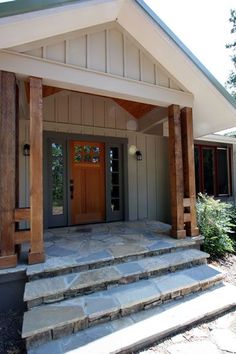 a house with steps leading up to the front door