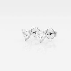 The Ethereal .50ct Trillion Stud Earrings will be your favorite pair for effortless everyday radiance. Featuring standout lab grown trillion cut diamonds set against 14K gold, this easy style will go with everything. The distinctive trillion cut offers a magnificent level of brilliance, so you can shine from the inside out. Classic Diamond Heart Earrings, Classic White Heart-cut Diamond Earrings, Classic White Heart Cut Diamond Earrings, Classic White Diamond Cut Heart Earrings, Diamond Heart Earrings With Prong Setting, White Heart Cut Earrings With Vvs Clarity, White Vvs Clarity Heart Cut Earrings, Classic Heart-shaped Diamond Earrings With Vvs Clarity, Classic Round Cut Diamond Heart Earrings